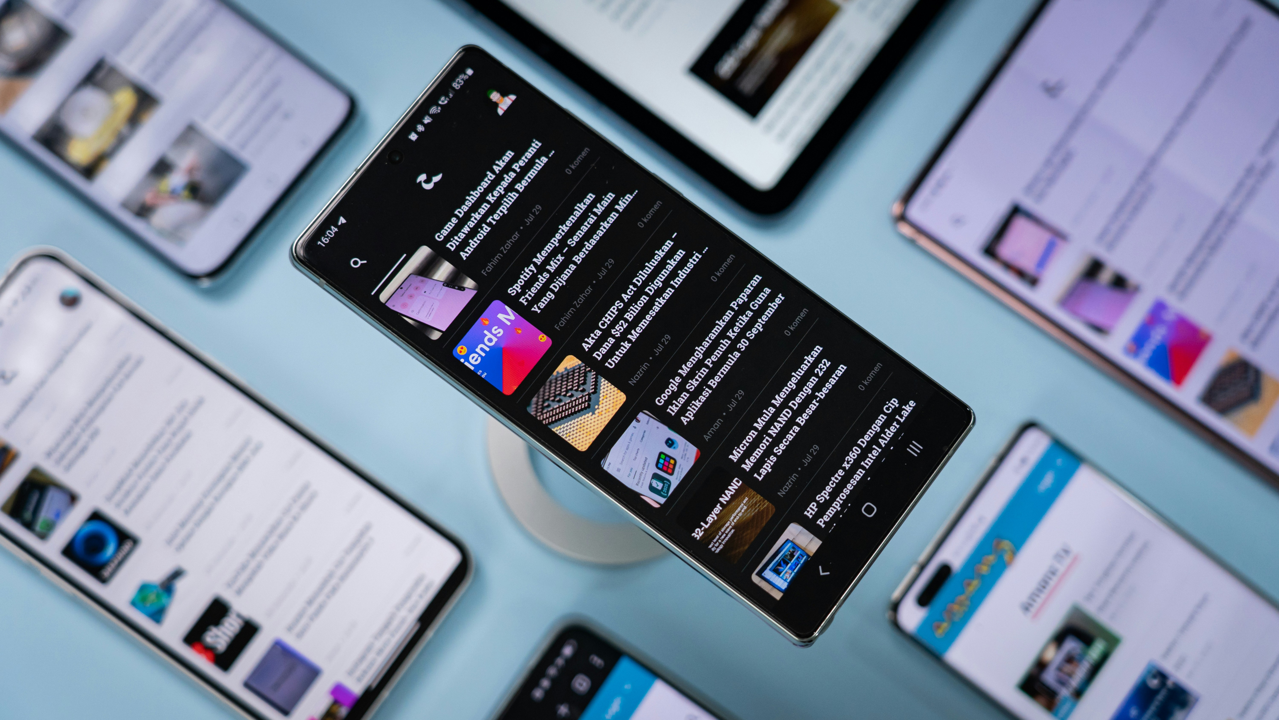 Smartphones displaying SHINKA's travel articles